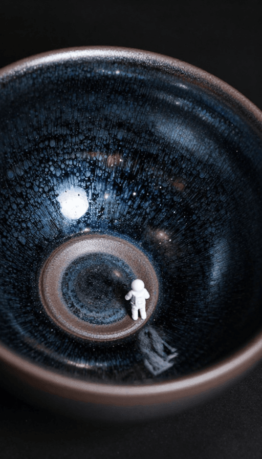 粒子特效素材：建盏陶艺与宇宙星辰的抽象交响